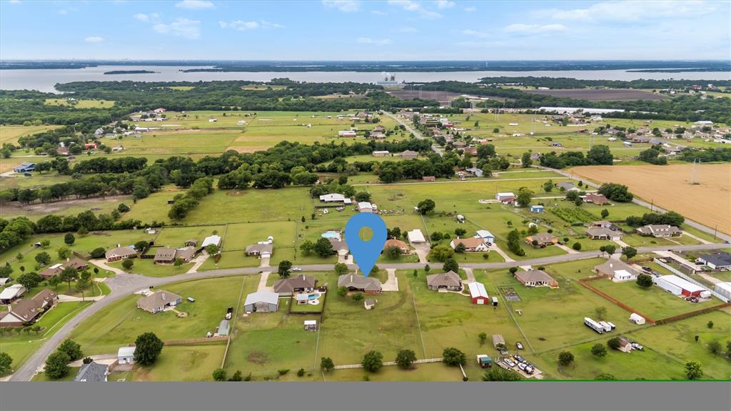 6581 Meadow Ridge Circle Nevada, TX 75173 - Photo 16 of 40 a view of a city with an ocean