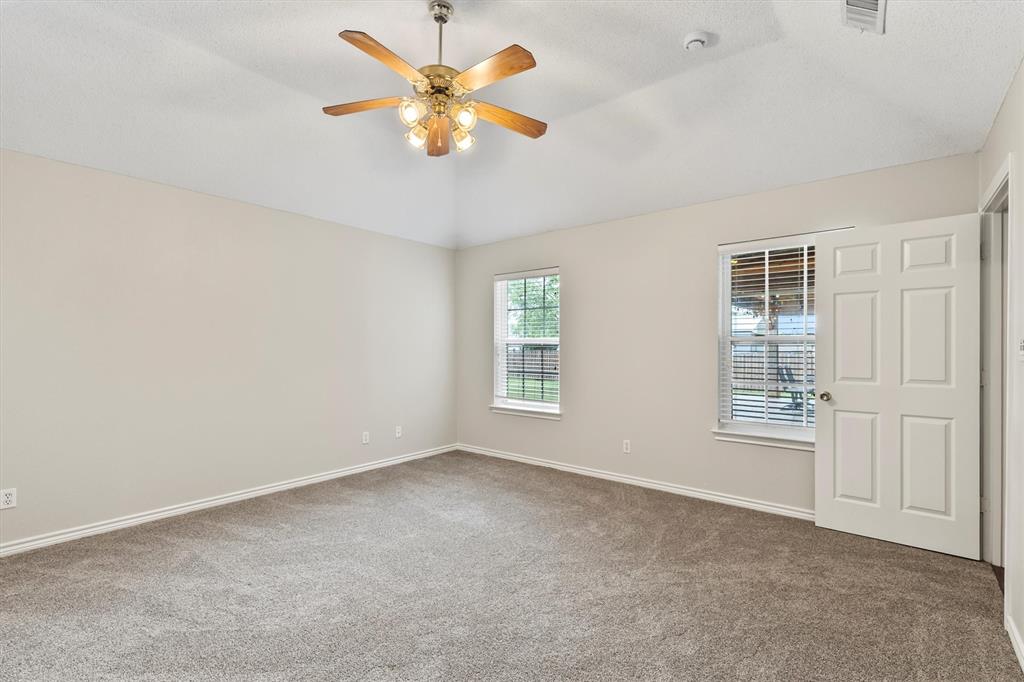 6581 Meadow Ridge Circle Nevada, TX 75173 - Photo 20 of 40 an empty room with windows