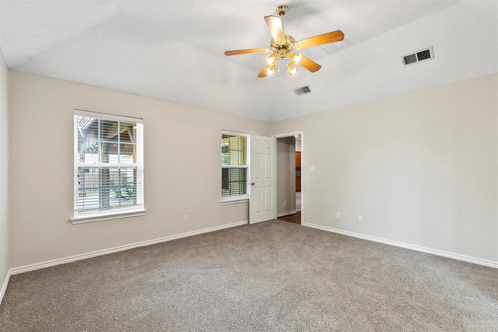 6581 Meadow Ridge Circle Nevada, TX 75173 - Photo 21 of 40 a view of an empty room with a window