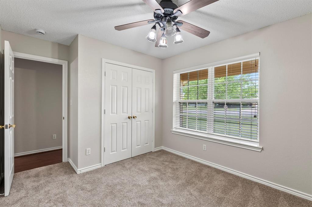 6581 Meadow Ridge Circle Nevada, TX 75173 - Photo 27 of 40 a view of an empty room with a window