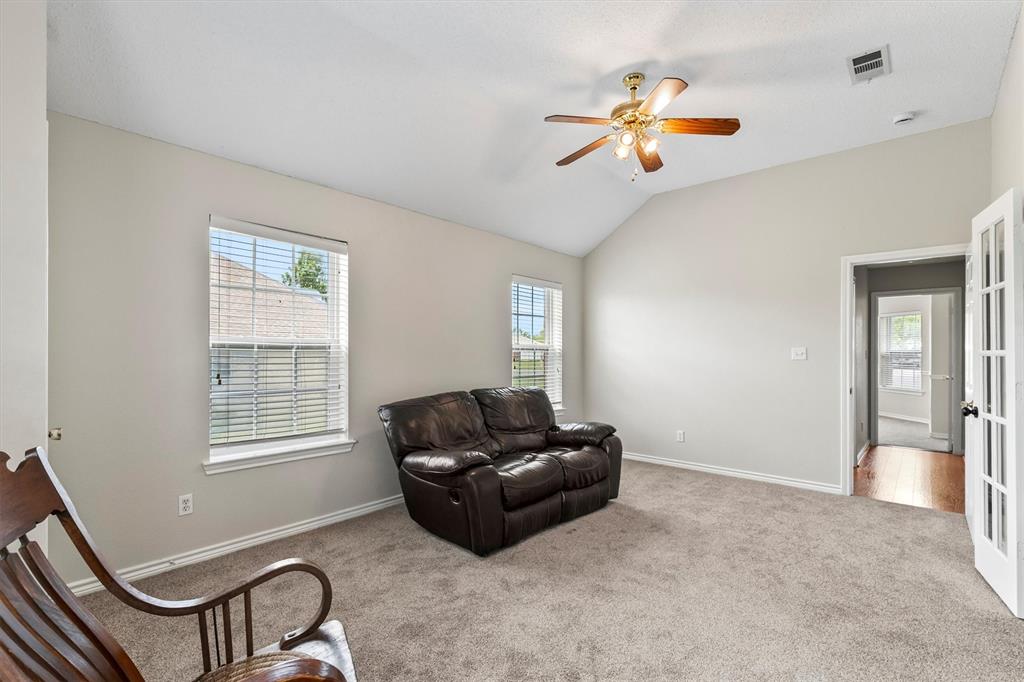 6581 Meadow Ridge Circle Nevada, TX 75173 - Photo 31 of 40 a living room with furniture and a window