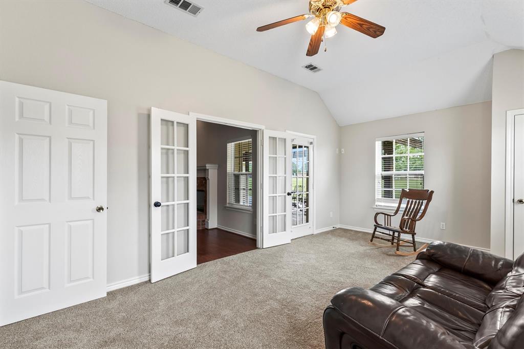 6581 Meadow Ridge Circle Nevada, TX 75173 - Photo 32 of 40 a living room with furniture