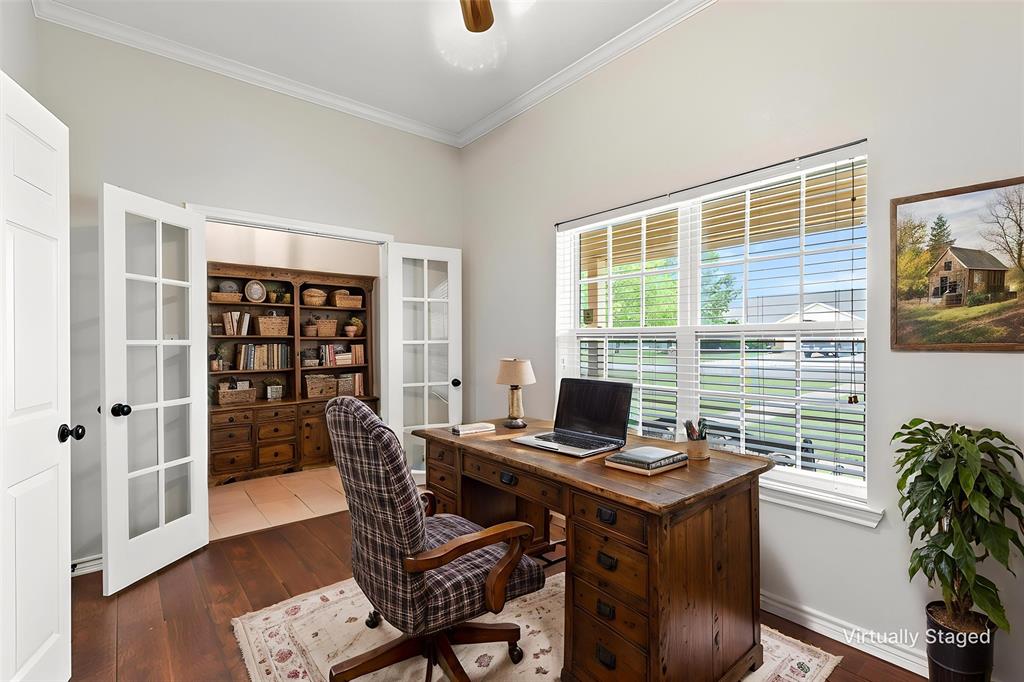 6581 Meadow Ridge Circle Nevada, TX 75173 - Photo 4 of 40 a view of a workspace with furniture and a window