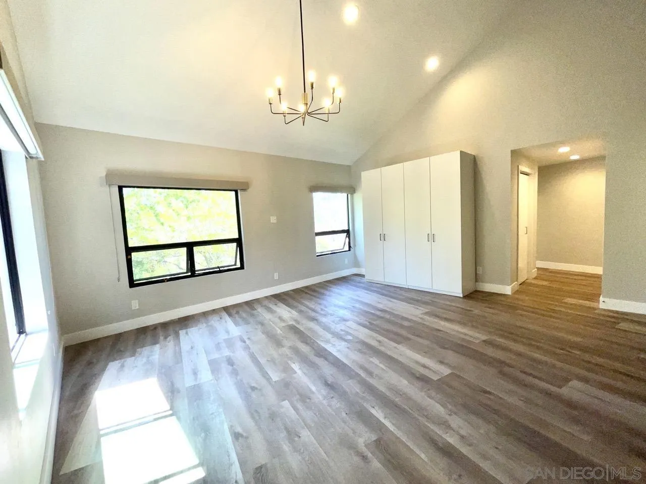 6611 Lago Corte Rancho Santa Fe, CA 92091 - Photo 15 of 38 wooden floor in an empty room with a window