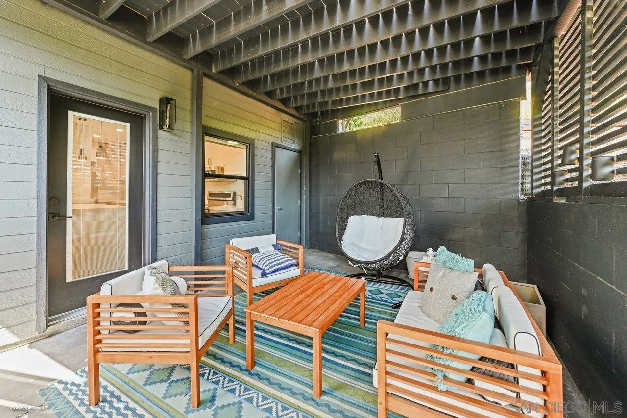 6611 Lago Corte Rancho Santa Fe, CA 92091 - Photo 27 of 38 a view of a balcony filled with furniture