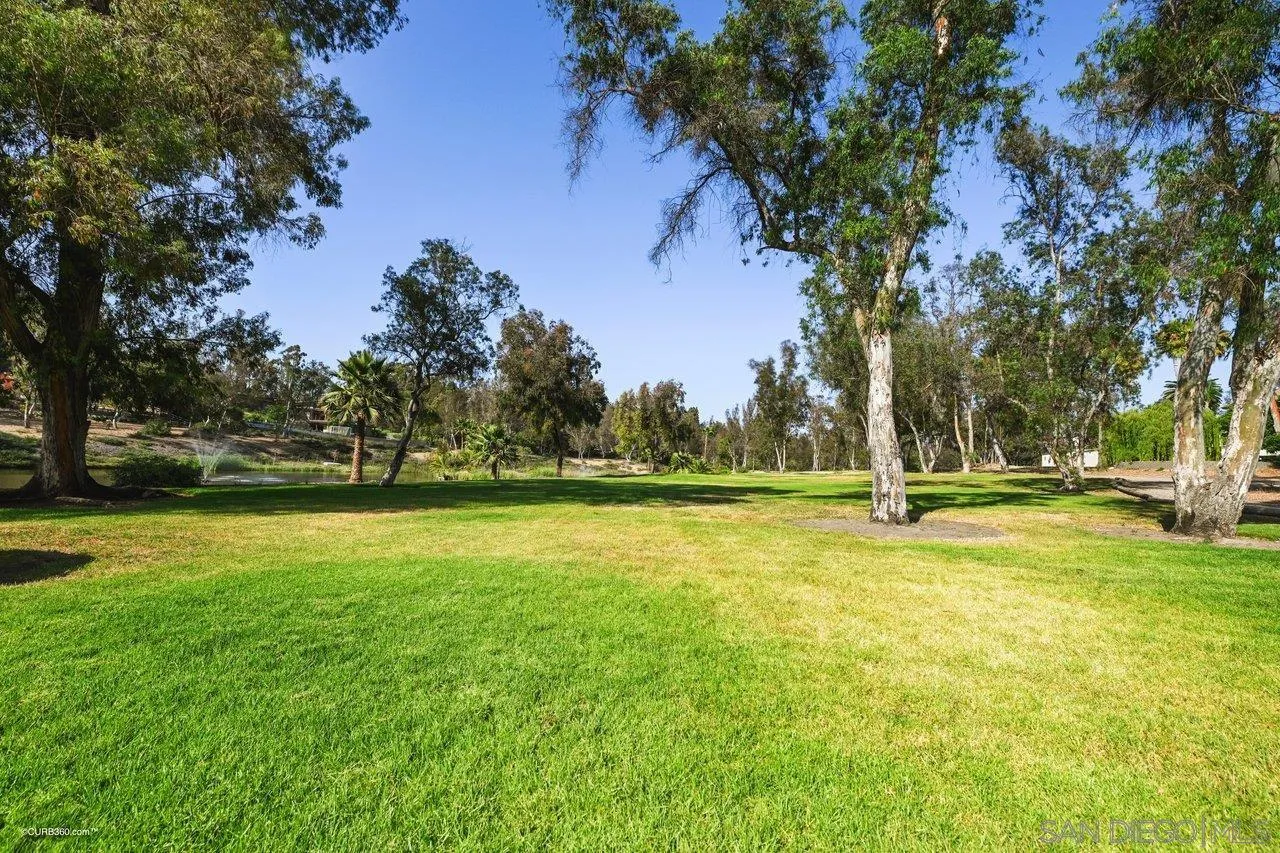 6611 Lago Corte Rancho Santa Fe, CA 92091 - Photo 37 of 38 a view of swimming pool with trees