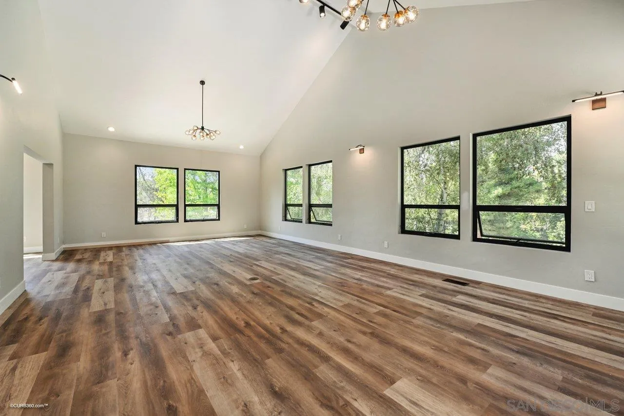 6611 Lago Corte Rancho Santa Fe, CA 92091 - Photo 10 of 38 an empty room with windows