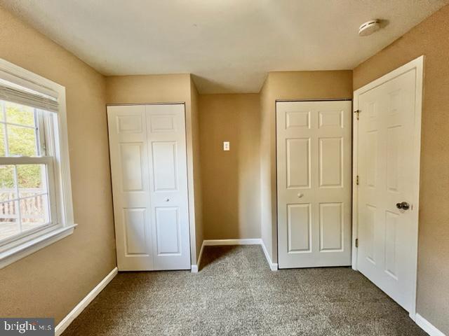 5128 Mangum Road College Park, MD 20740 - Photo 13 of 40 an empty room with windows and closet