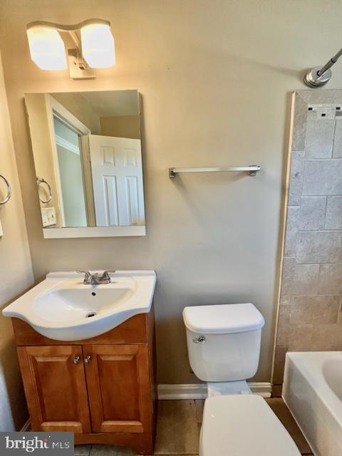 5128 Mangum Road College Park, MD 20740 - Photo 14 of 40 a bathroom with a sink and a toilet