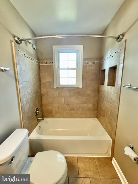 5128 Mangum Road College Park, MD 20740 - Photo 15 of 40 a bathroom with a bathtub and a shower