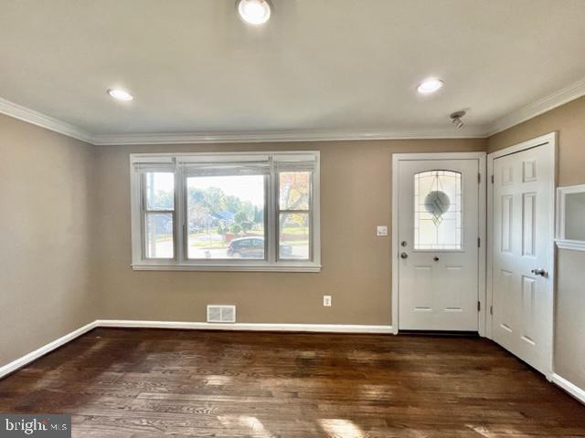 5128 Mangum Road College Park, MD 20740 - Photo 2 of 40 an empty room with wooden floor and windows