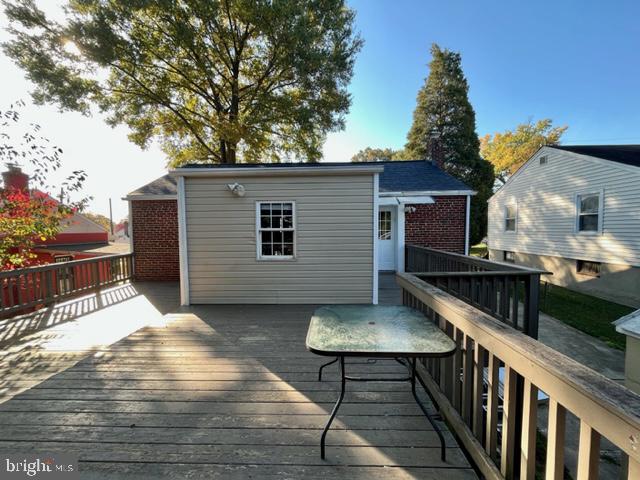 5128 Mangum Road College Park, MD 20740 - Photo 25 of 40 a view of a house with backyard and sitting area