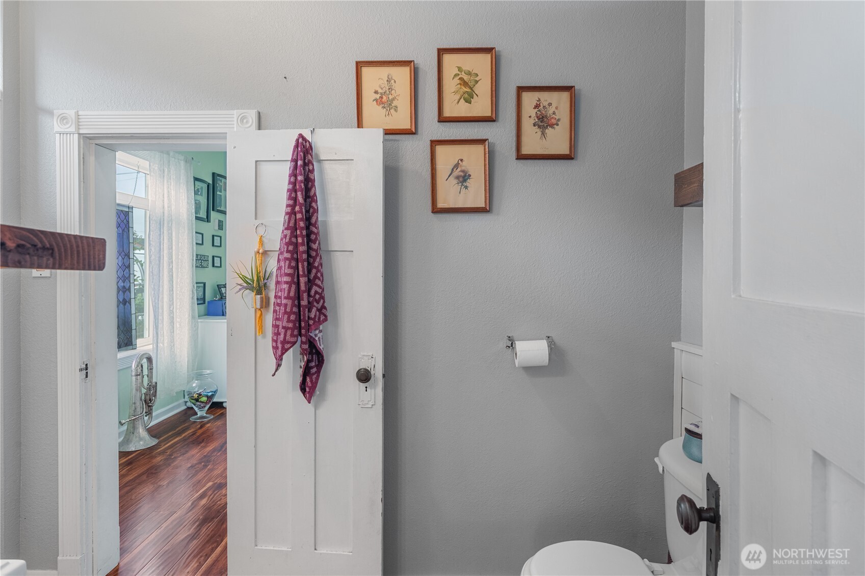 527 South 5th Street Montesano, WA 98563 - Photo 13 of 40 a bathroom with a shower curtain and a toilet