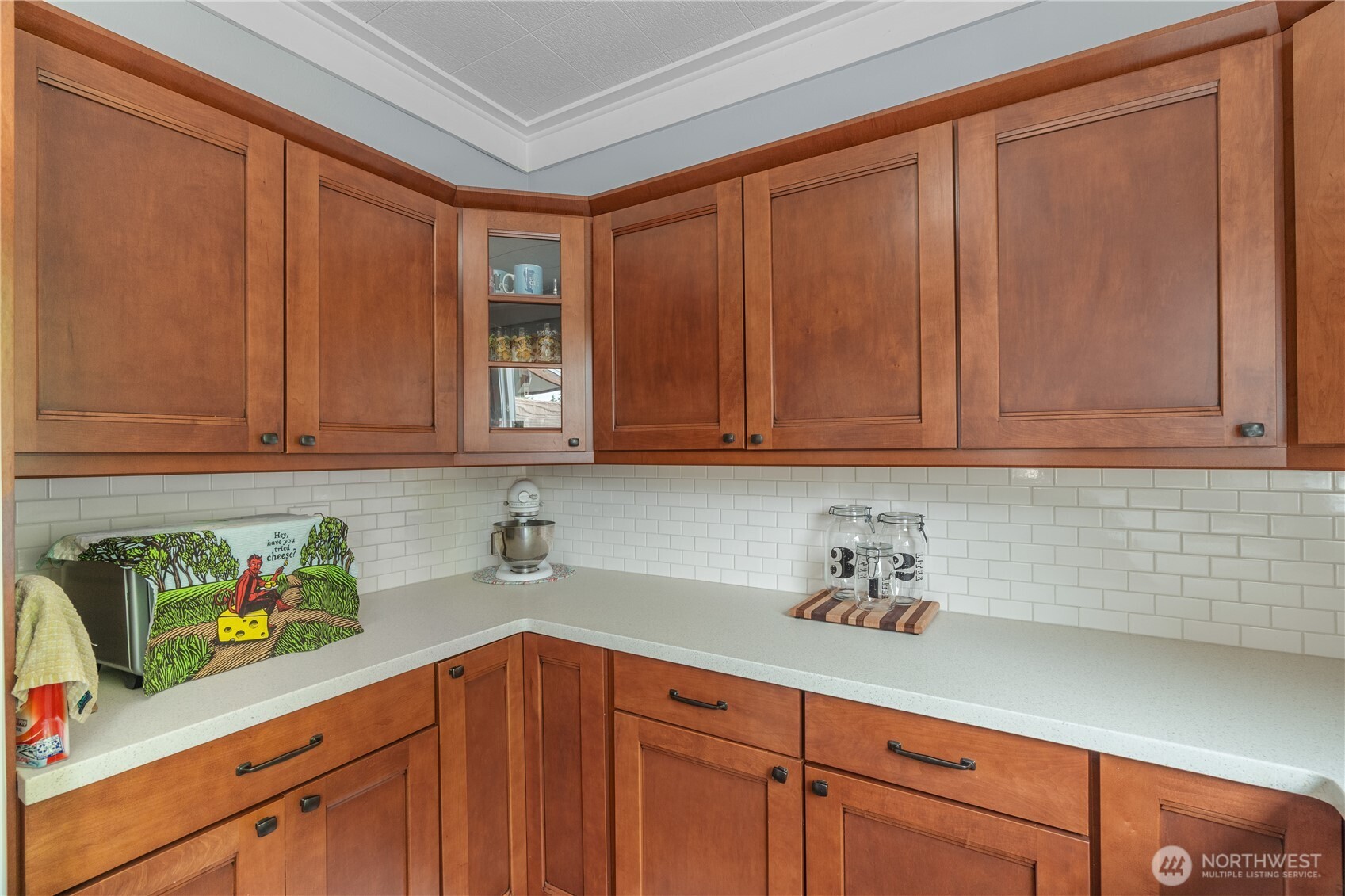 527 South 5th Street Montesano, WA 98563 - Photo 20 of 40 a kitchen with stainless steel appliances granite countertop wooden cabinets a sink and dishwasher