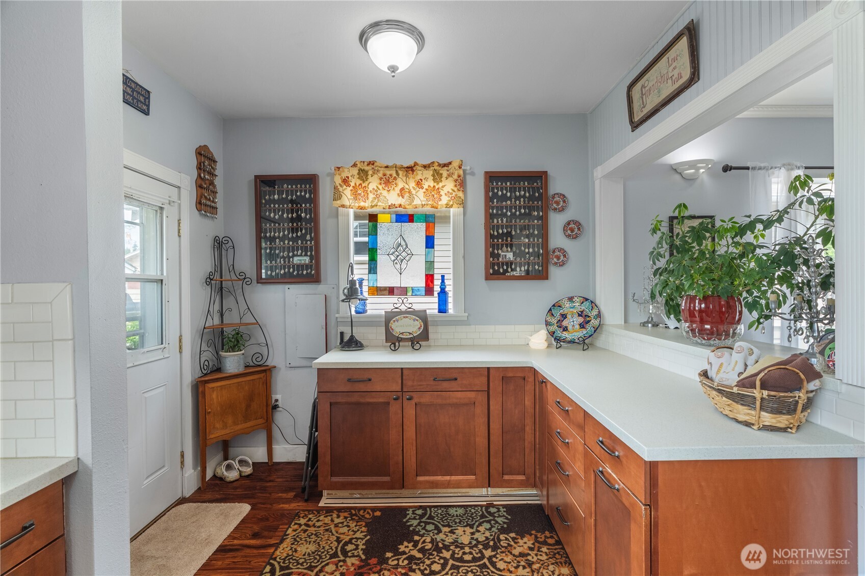 527 South 5th Street Montesano, WA 98563 - Photo 21 of 40 a kitchen with a sink and a refrigerator