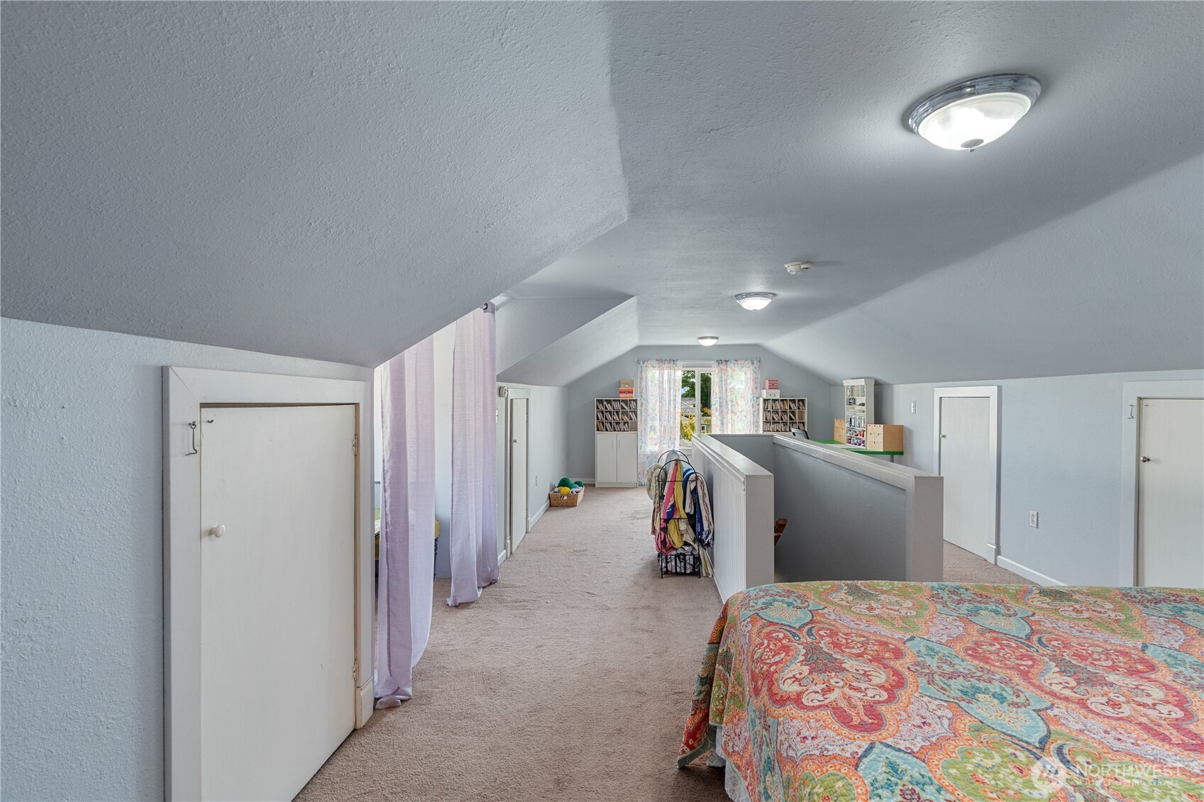 527 South 5th Street Montesano, WA 98563 - Photo 29 of 40 a bedroom with bed and walk in closet