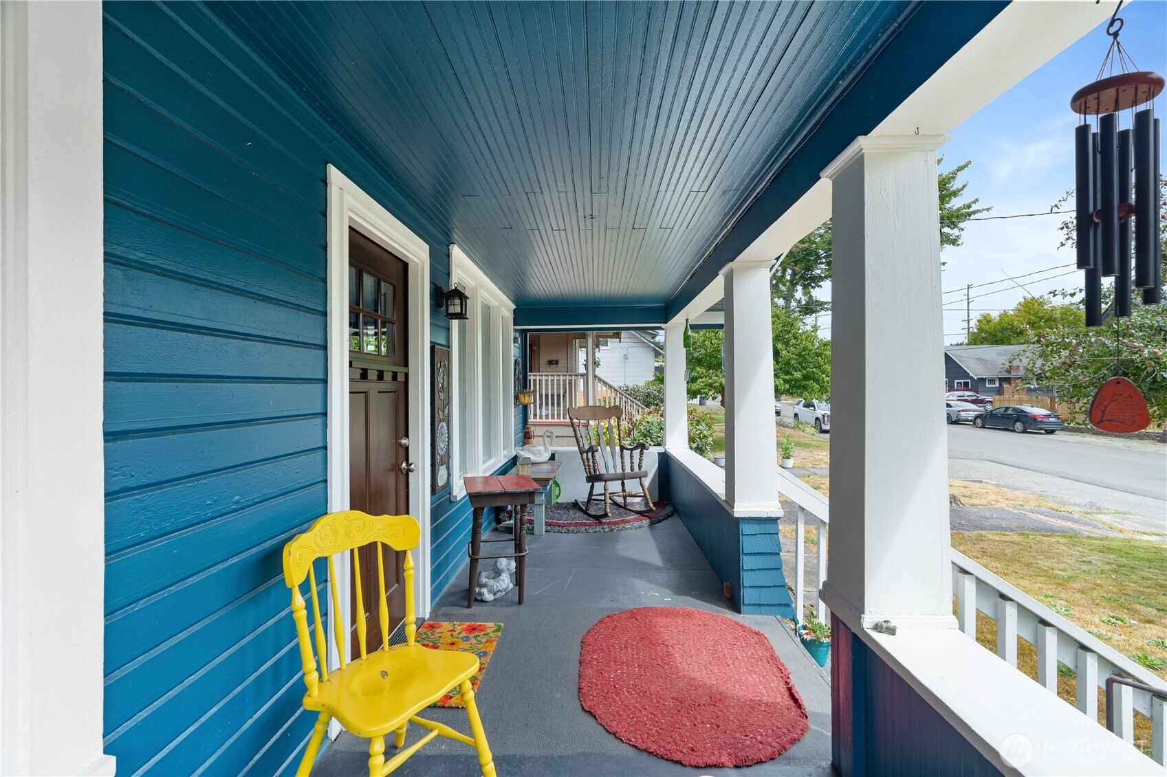 527 South 5th Street Montesano, WA 98563 - Photo 4 of 40 a view of a patio with table and chairs potted plants with wooden floor and fence