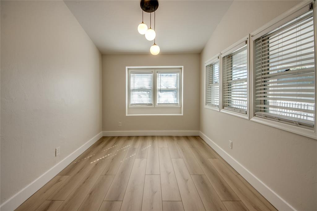 6205 Deer Run Fort Myers, FL 33908 - Photo 20 of 52 a view of an empty room with wooden floor and a window