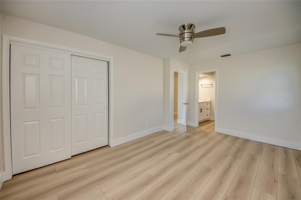 6205 Deer Run Fort Myers, FL 33908 - Photo 36 of 52 wooden floor in an empty room