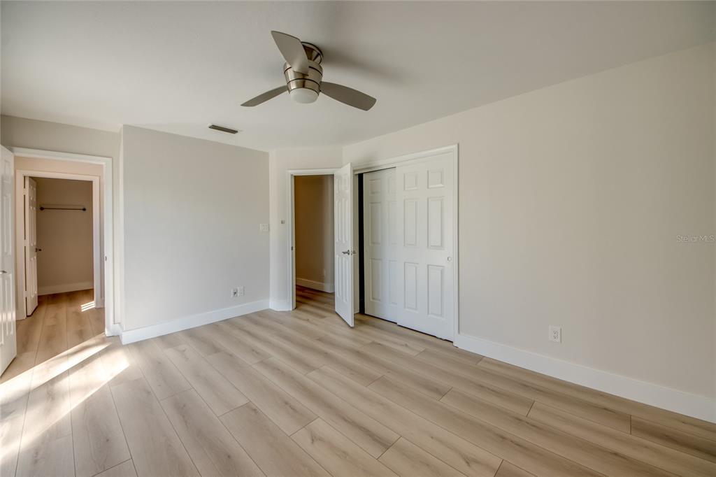6205 Deer Run Fort Myers, FL 33908 - Photo 42 of 52 a view of empty room with wooden floor