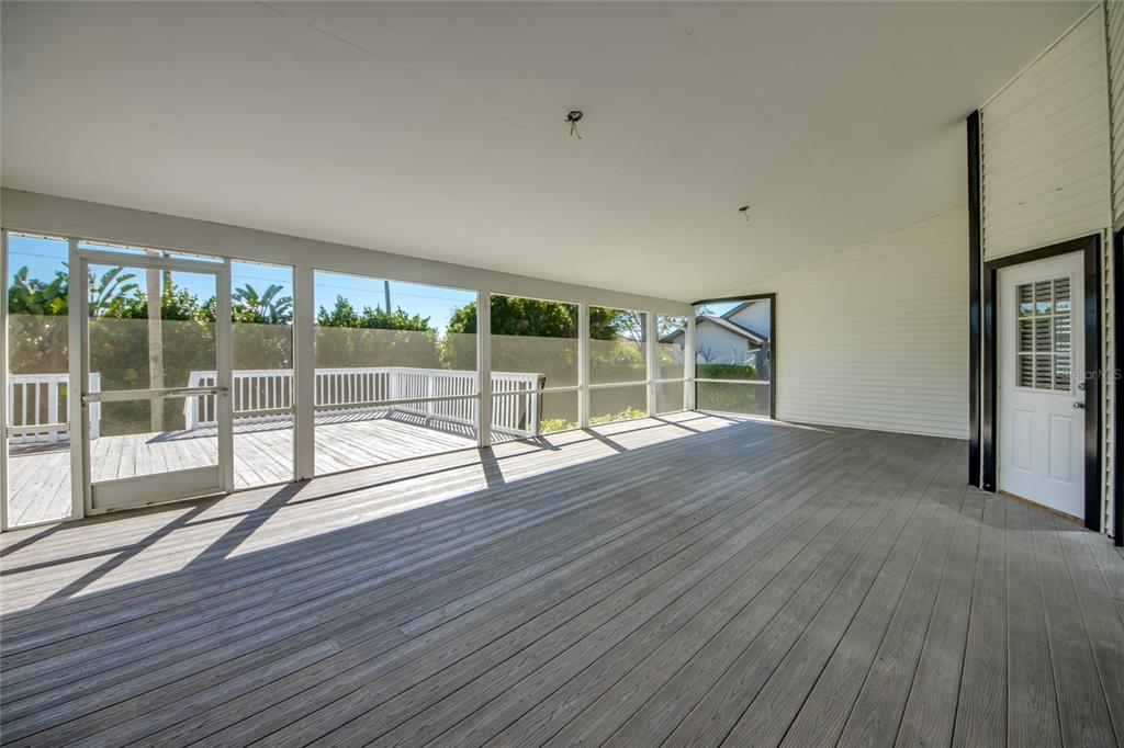6205 Deer Run Fort Myers, FL 33908 - Photo 44 of 52 a view of empty room with wooden floor and fan