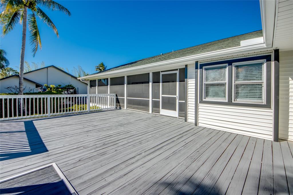 6205 Deer Run Fort Myers, FL 33908 - Photo 49 of 52 a view of a house with wooden deck