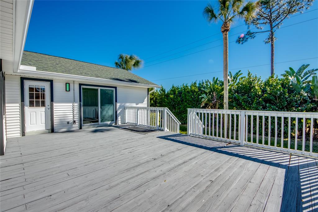 6205 Deer Run Fort Myers, FL 33908 - Photo 50 of 52 a view of a house with wooden deck