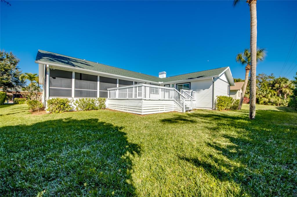 6205 Deer Run Fort Myers, FL 33908 - Photo 51 of 52 a front view of a house with a yard