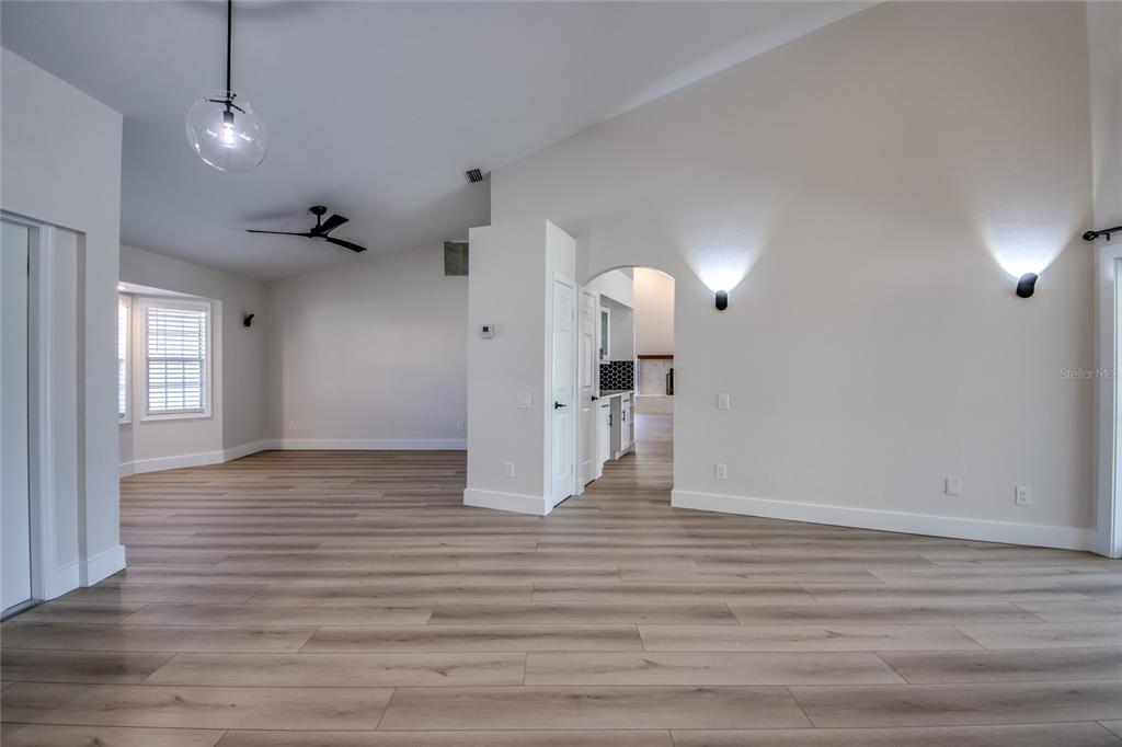 6205 Deer Run Fort Myers, FL 33908 - Photo 9 of 52 a view of empty room with wooden floor