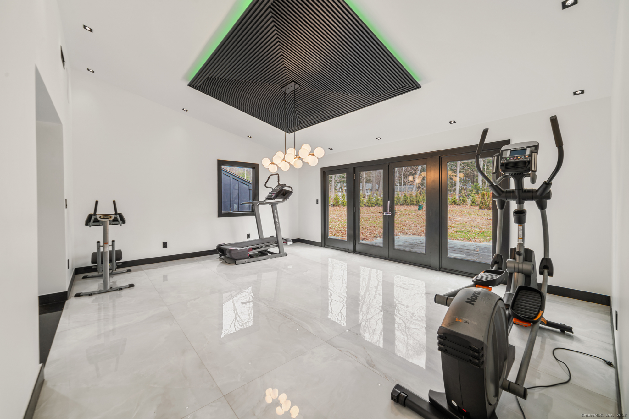 113 Woodbrook Drive Stamford, CT 06907 - Photo 13 of 39 a view of a room with gym equipment