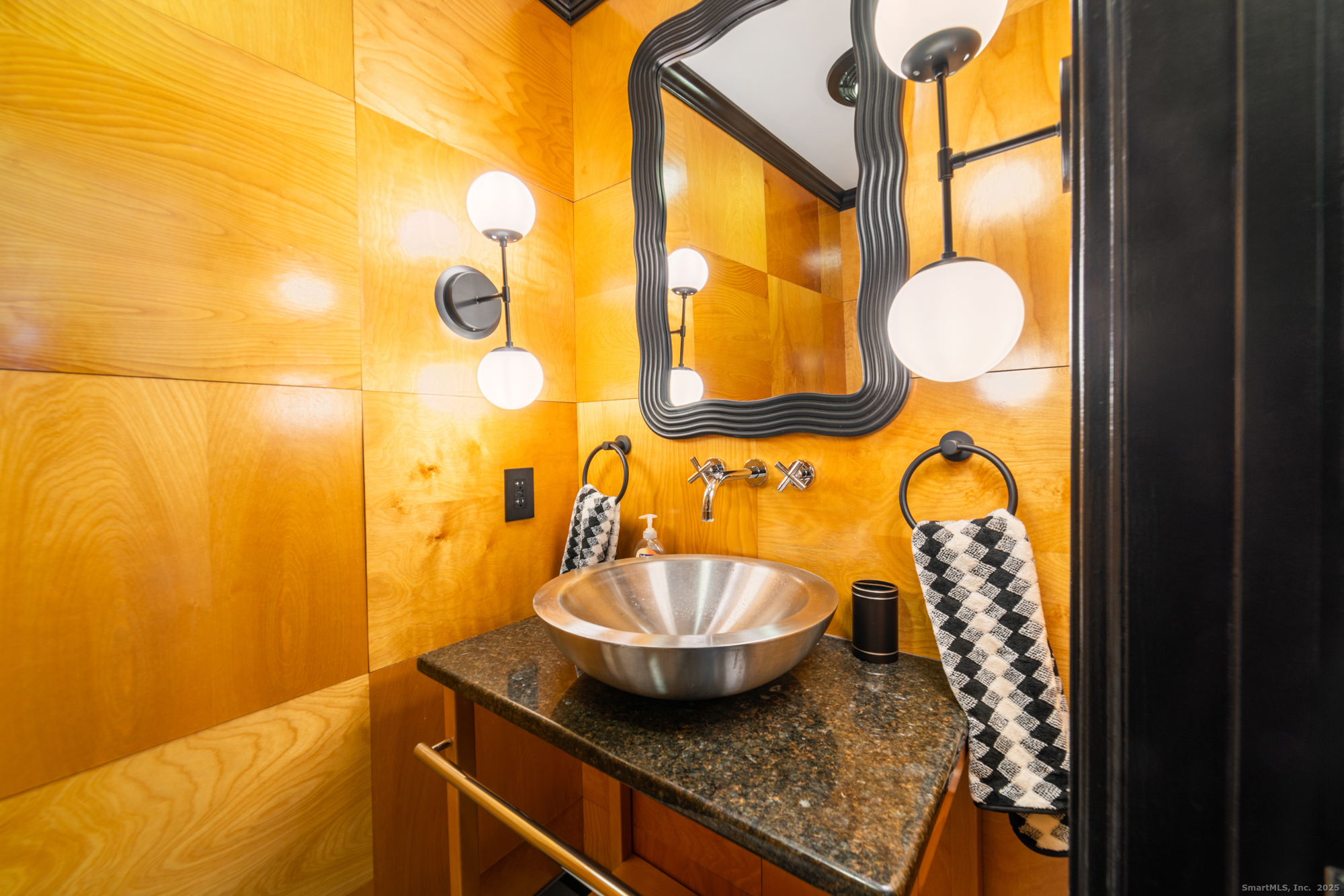 113 Woodbrook Drive Stamford, CT 06907 - Photo 15 of 39 a bathroom with a granite countertop sink and a mirror