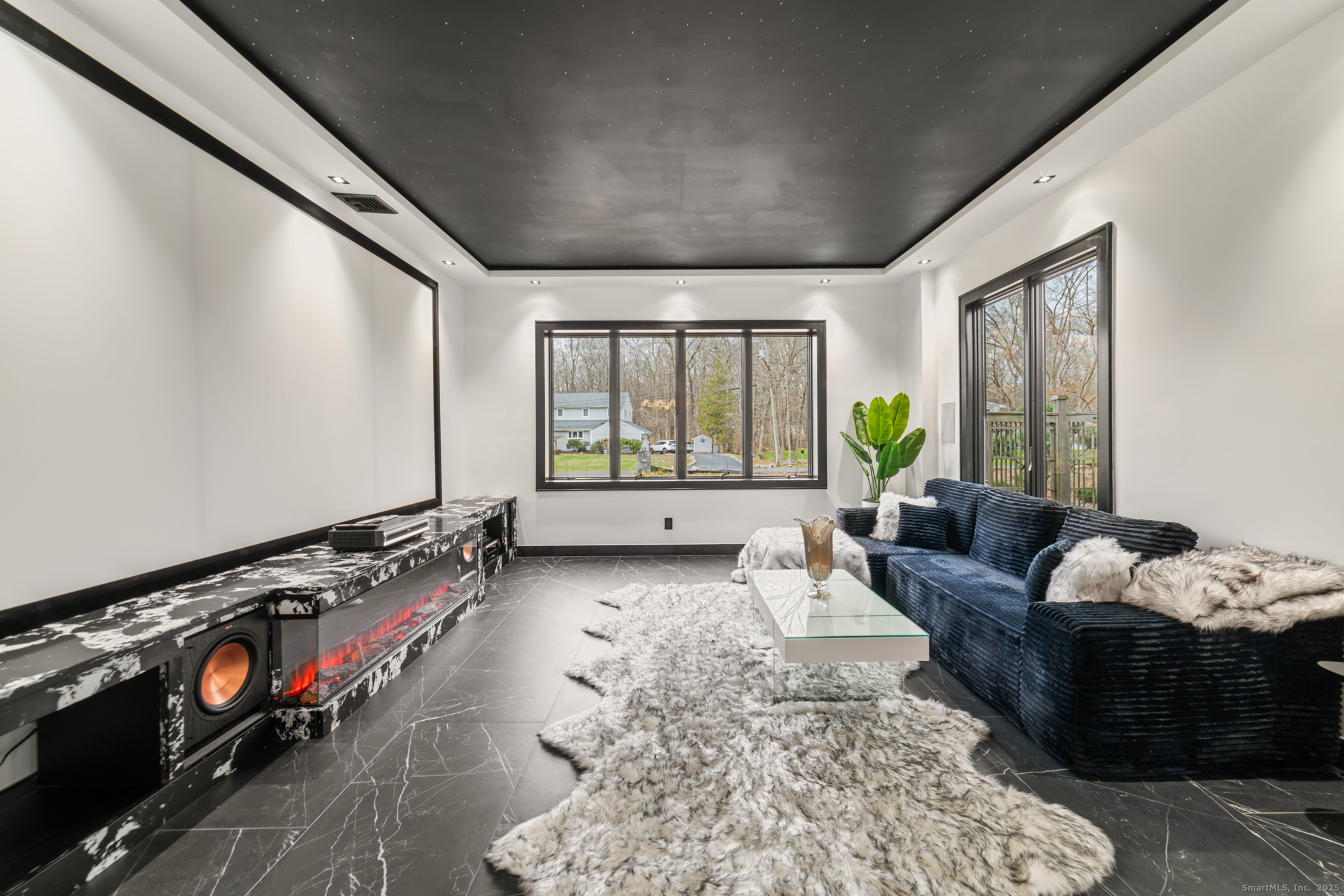 113 Woodbrook Drive Stamford, CT 06907 - Photo 17 of 39 a living room with furniture and a large window