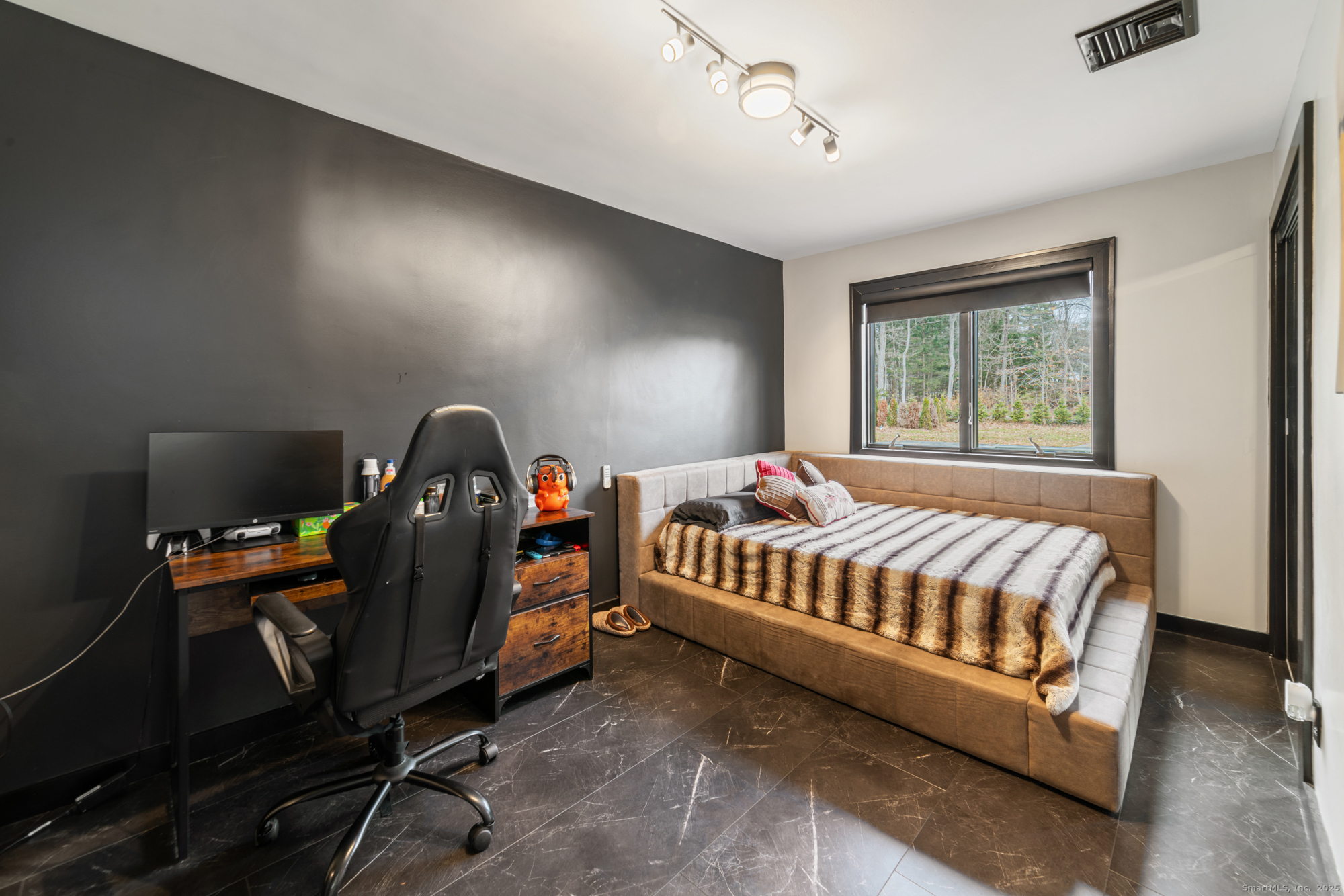 113 Woodbrook Drive Stamford, CT 06907 - Photo 18 of 39 a bedroom with a bed and a dresser