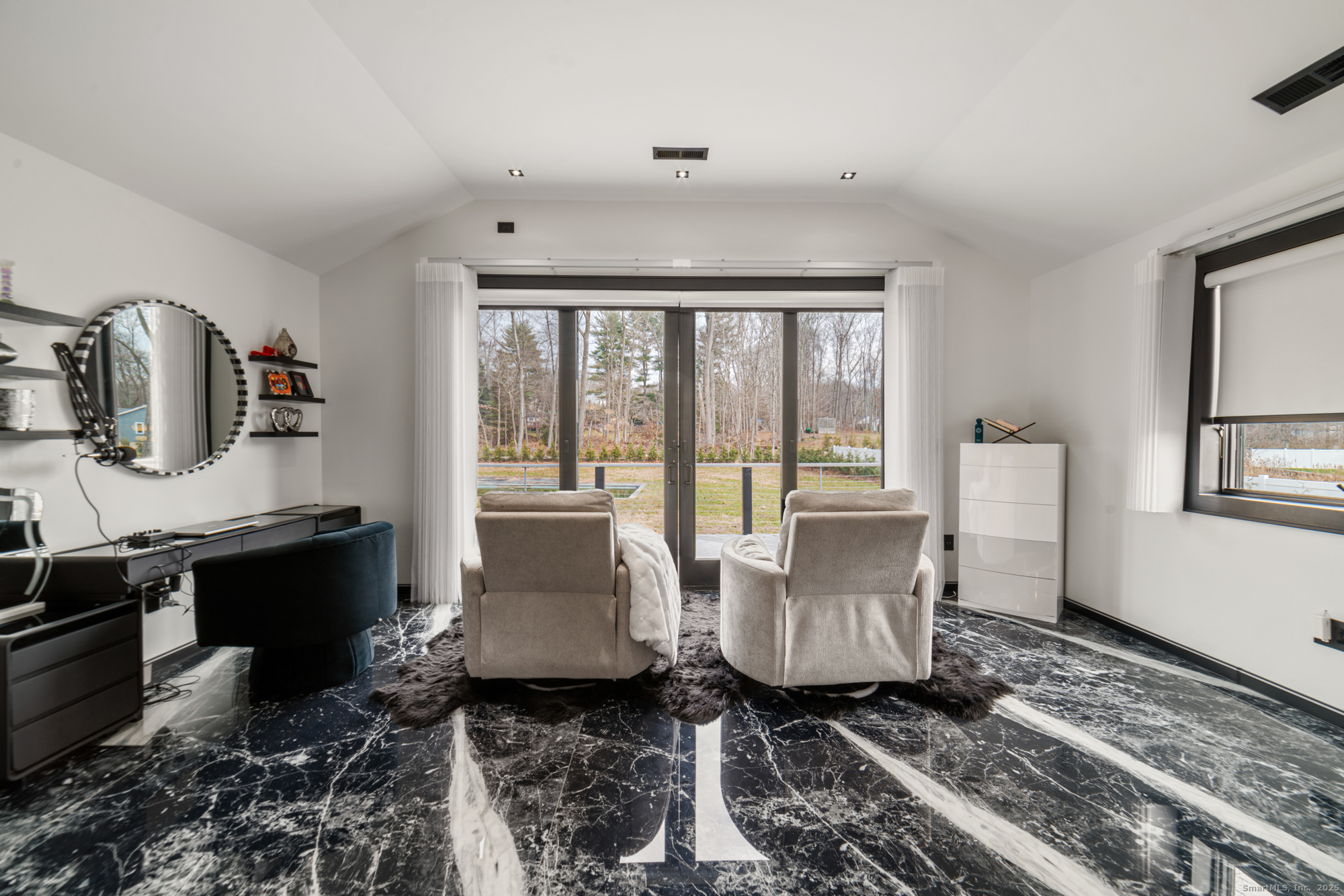 113 Woodbrook Drive Stamford, CT 06907 - Photo 29 of 39 a living room with furniture and wooden floor