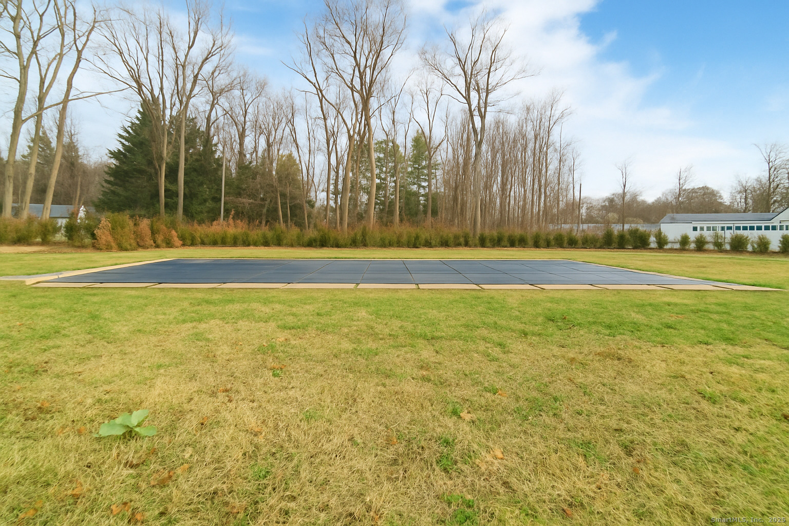 113 Woodbrook Drive Stamford, CT 06907 - Photo 36 of 39 a view of a swimming pool with an outdoor space and seating area