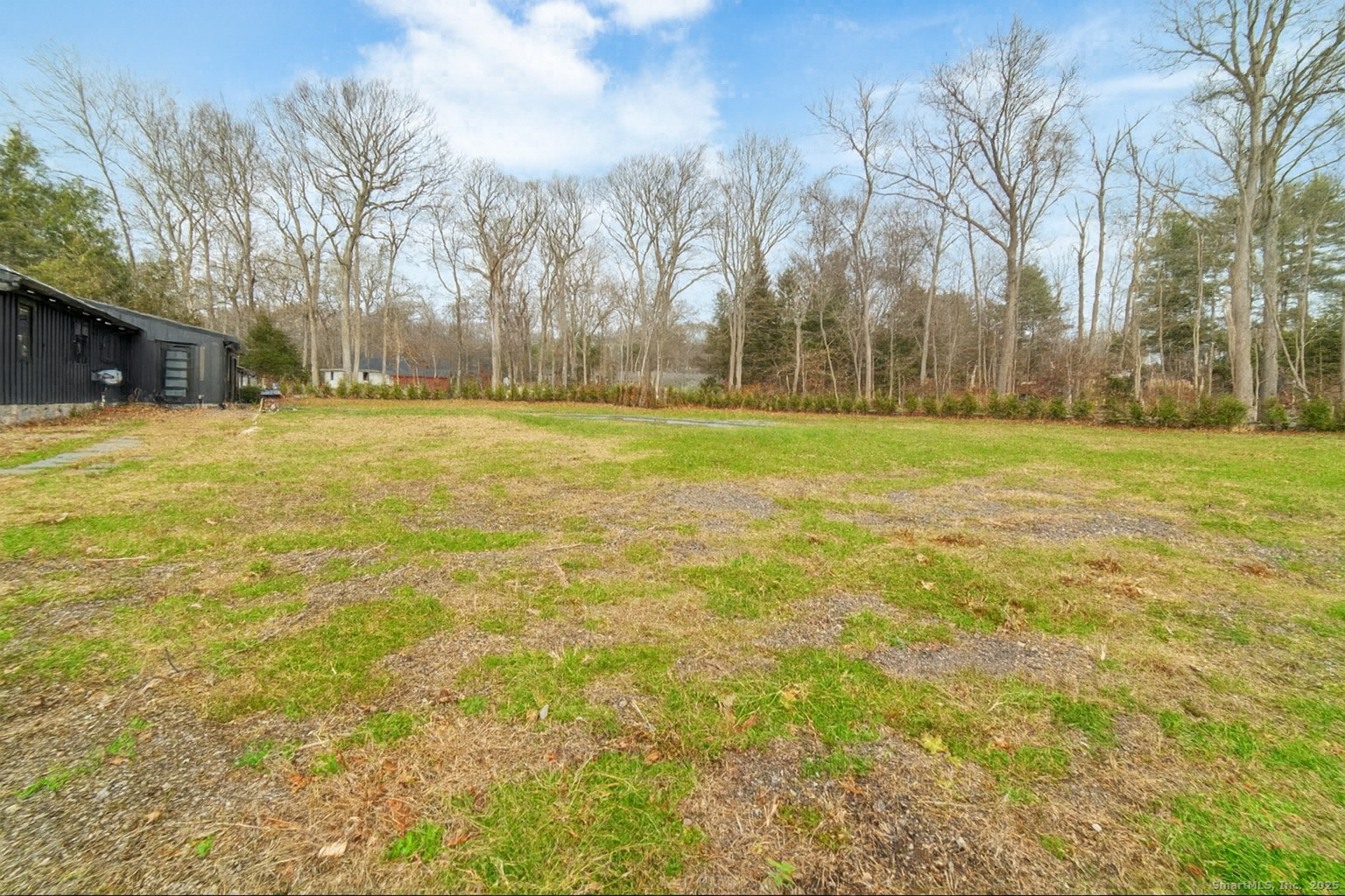 113 Woodbrook Drive Stamford, CT 06907 - Photo 38 of 39 a view of a yard with a house