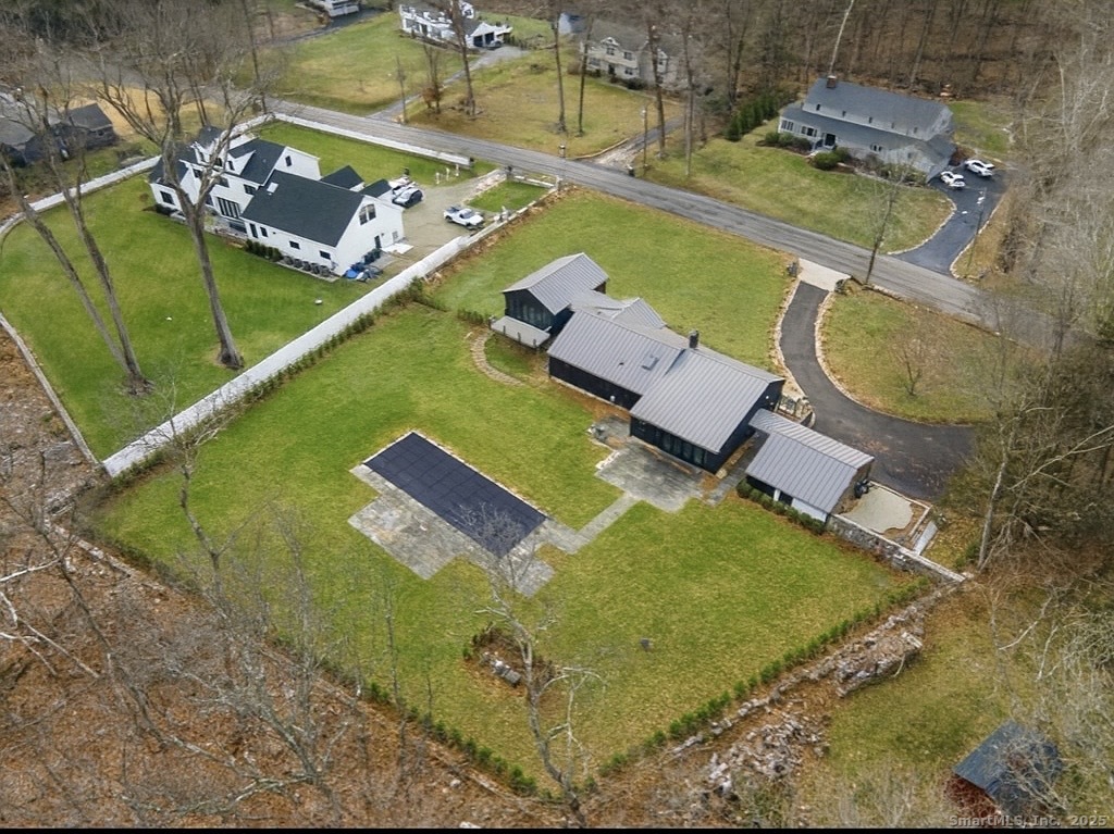 113 Woodbrook Drive Stamford, CT 06907 - Photo 39 of 39 an aerial view of a house with a swimming pool
