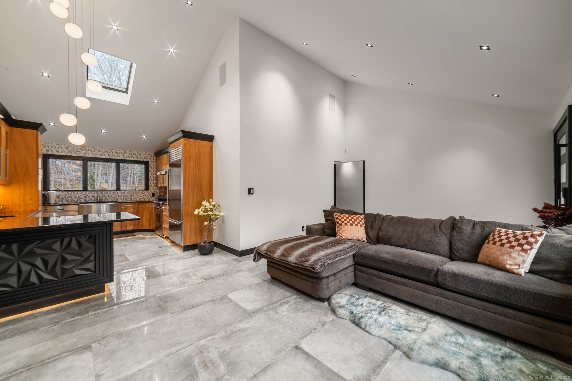 113 Woodbrook Drive Stamford, CT 06907 - Photo 5 of 39 a living room with furniture and a couch