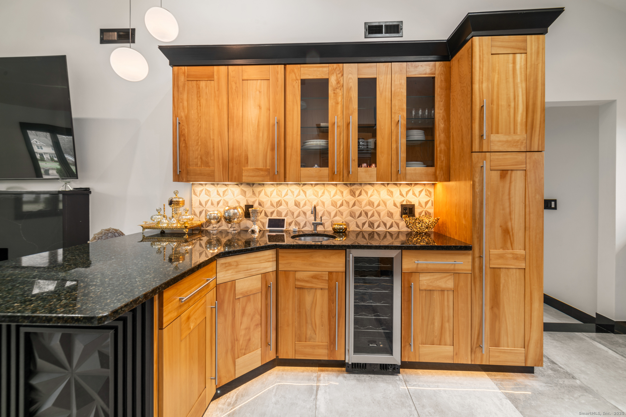 113 Woodbrook Drive Stamford, CT 06907 - Photo 9 of 39 a kitchen with granite countertop sink and cabinets