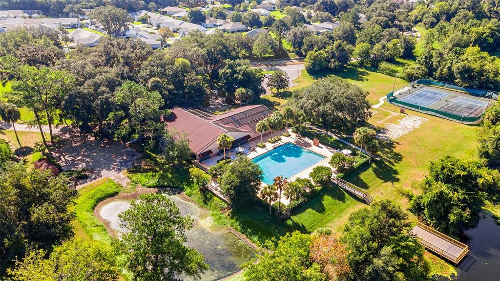 2656 Southwest 20th Circle Ocala, FL 34471 - Photo 6 of 6 an aerial view of residential house with swimming pool and outdoor space