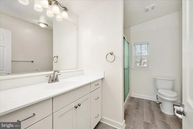 a bedroom with bed and window