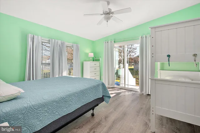 a view of a porch with wooden floor