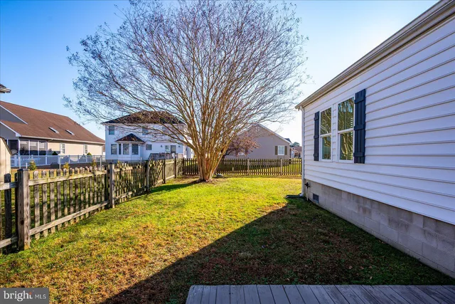 a view of a wrought iron fences in front of house