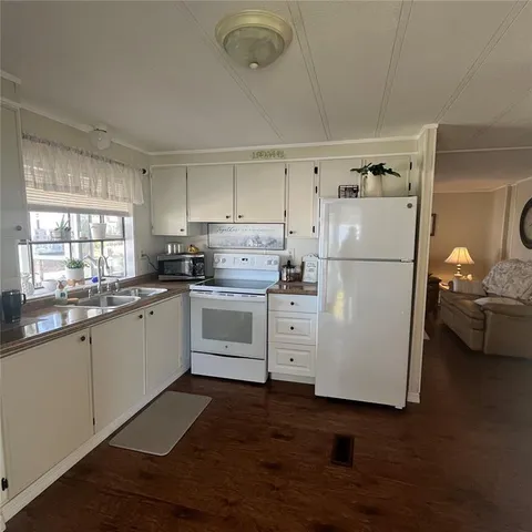 a living room with furniture and window