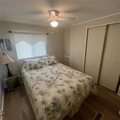 a bathroom with a shower and a toilet