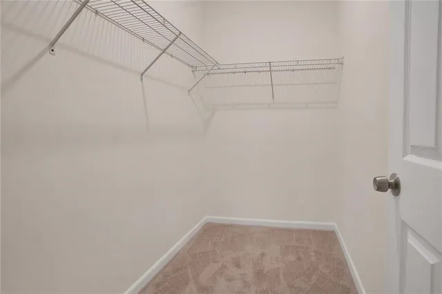 a view of a room with racks on the wall