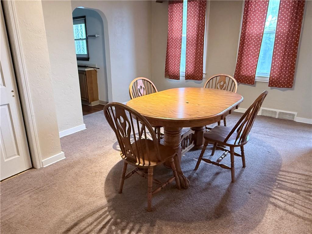 112 Greydon Avenue McKees Rocks, PA 15136 - Photo 8 of 14 a dining room with furniture and wooden floor