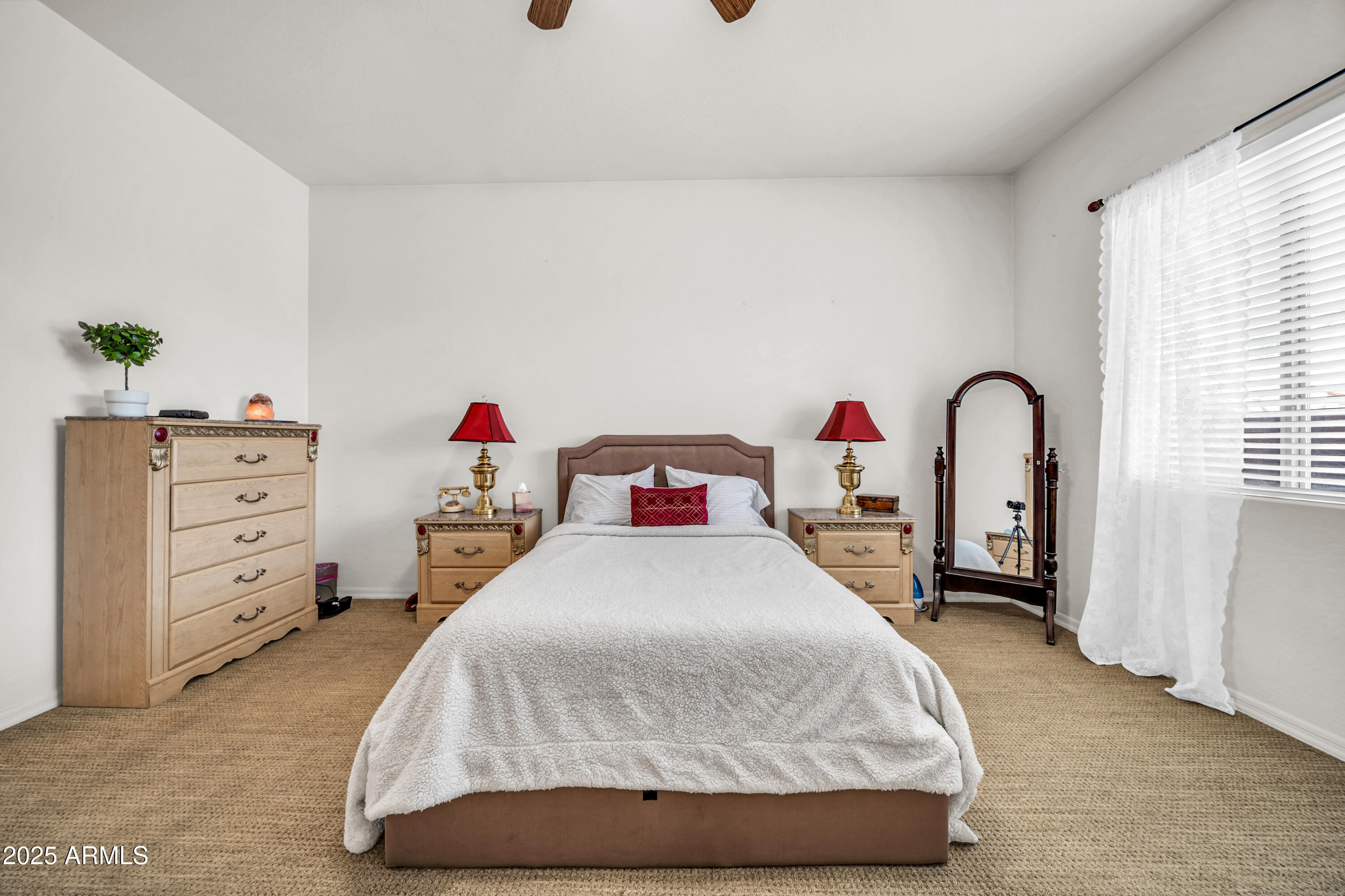 4314 West Summerside Road Laveen, AZ 85339 - Photo 14 of 26 a bedroom with a bed and a dresser