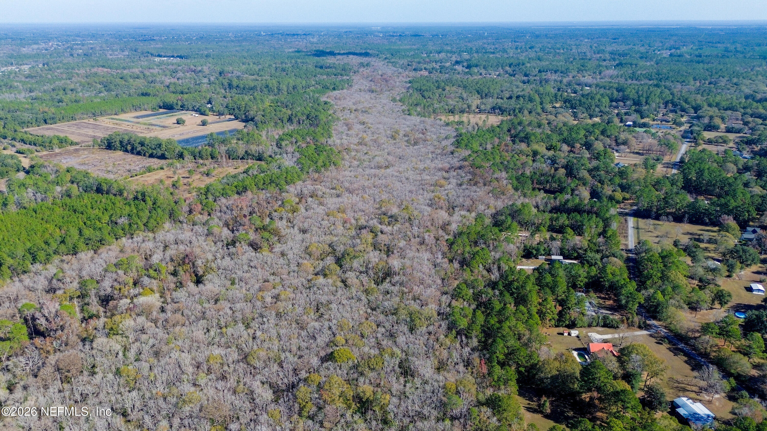 7847 Red Top Road Macclenny, FL 32063 - Photo 17 of 23 an aerial view of a houses with a yard