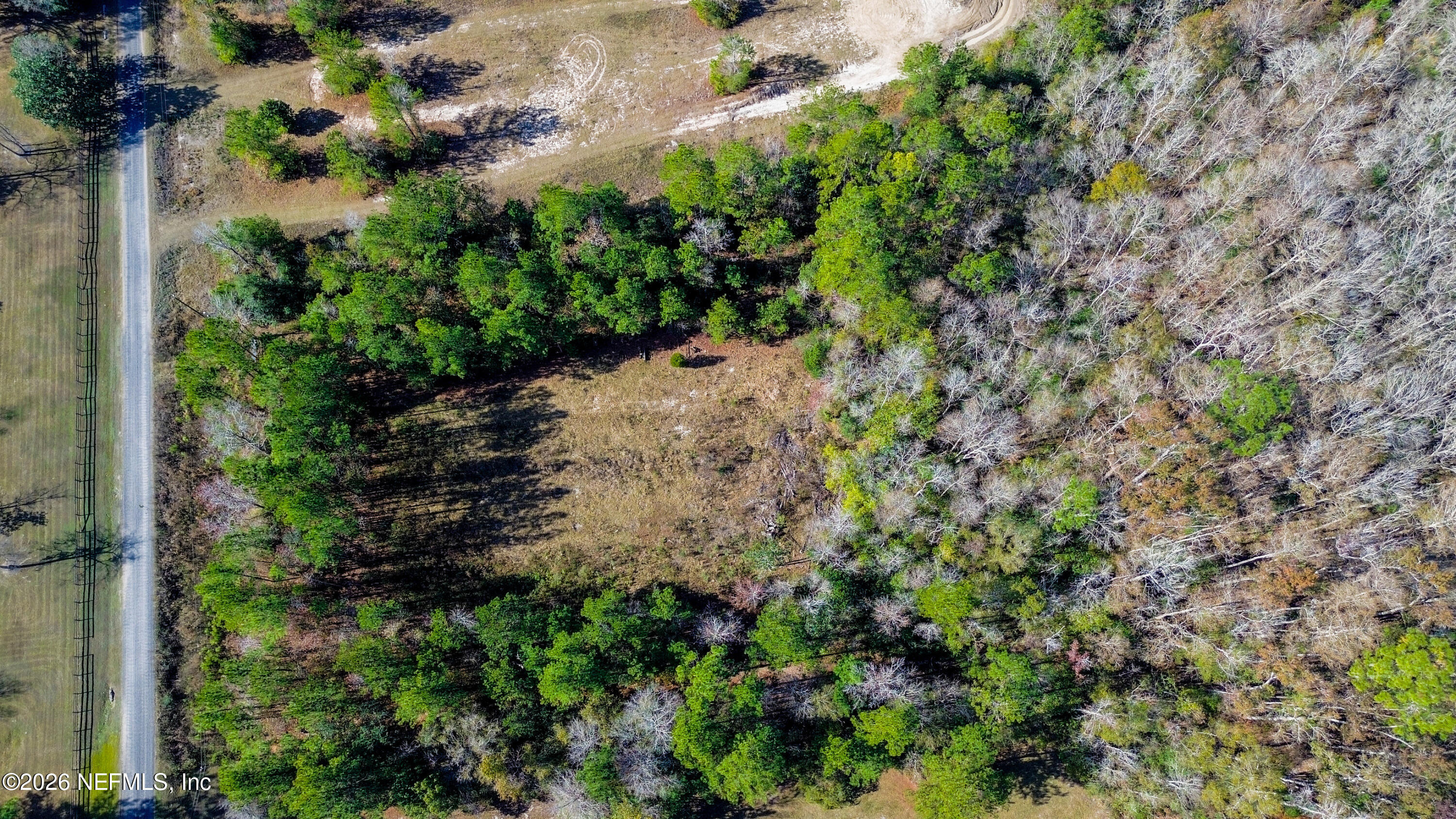7847 Red Top Road Macclenny, FL 32063 - Photo 6 of 23 an aerial view of residential house with outdoor space and trees all around